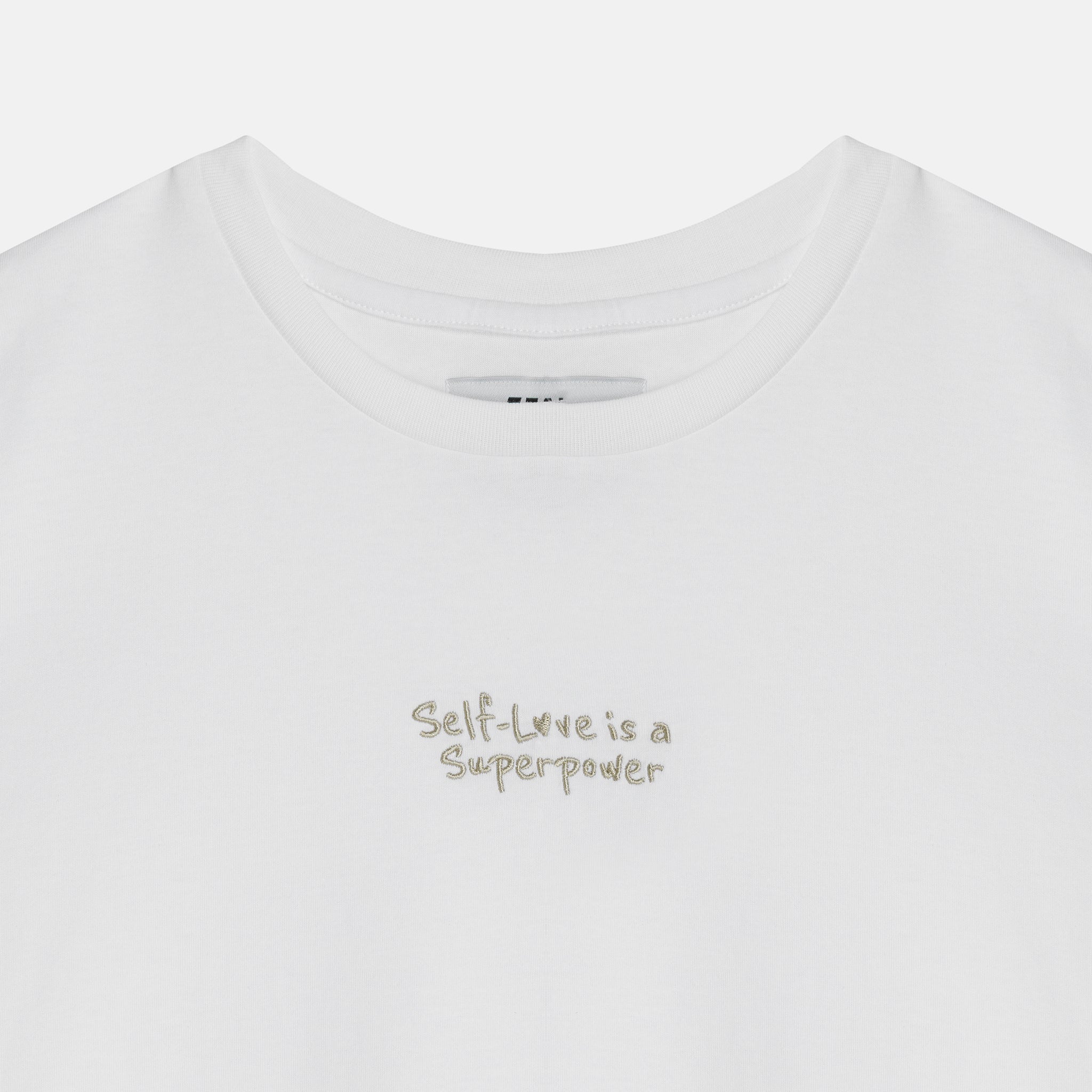 "love is a superpower" IN CLAY T-SHIRT