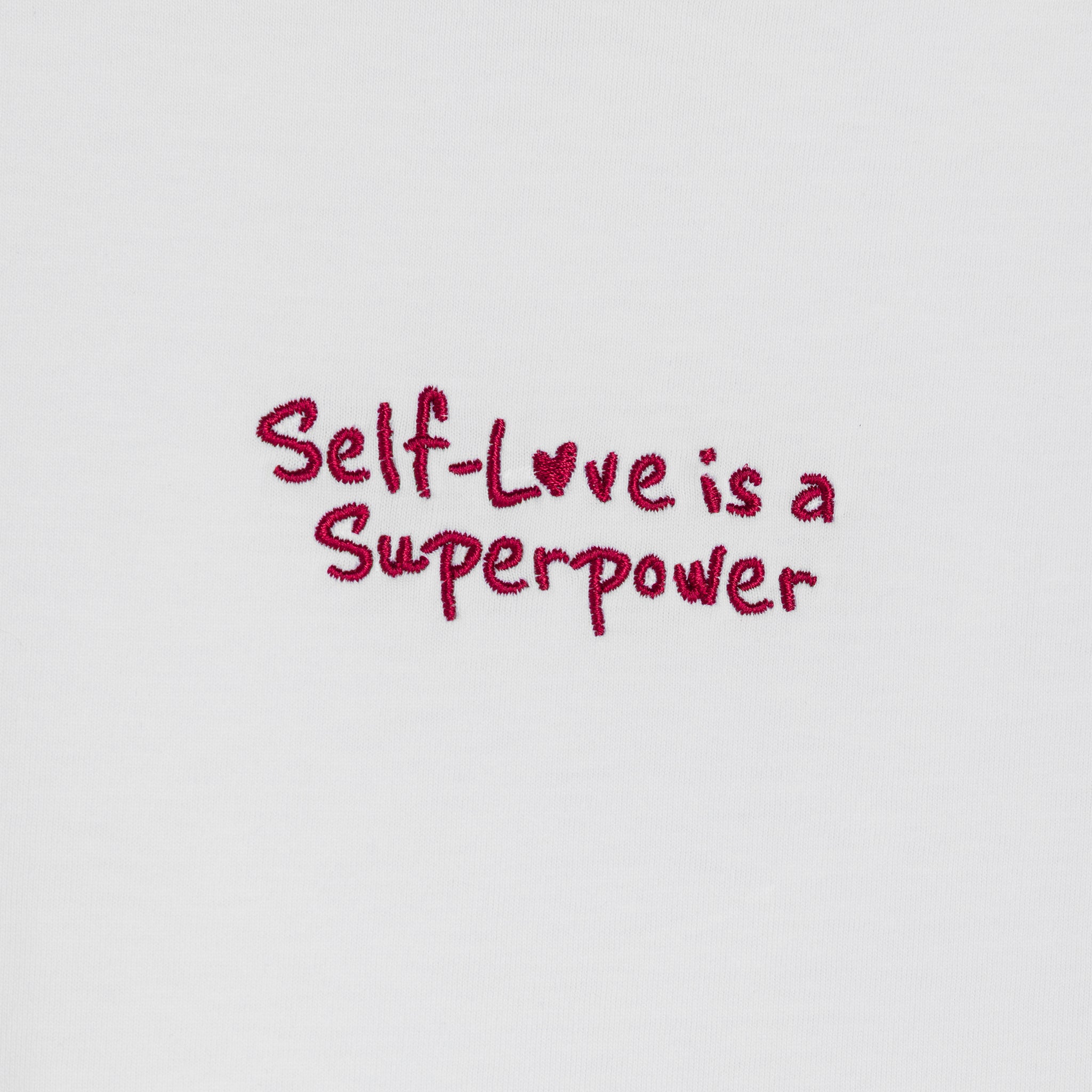 "love is a superpower" IN CHERRY T-SHIRT